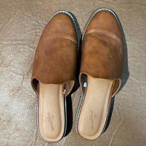 Universal threads mule with small square heel.